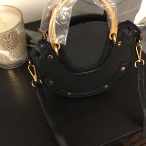 Black crossbody bag never used